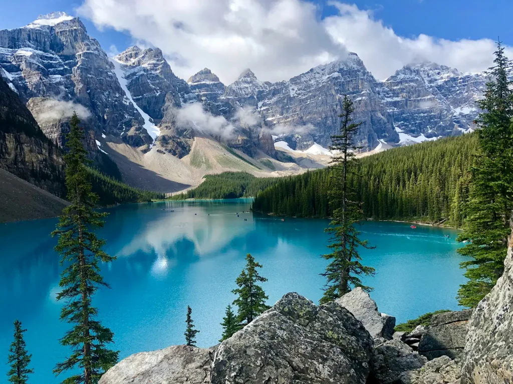 view of a lake with mountains in the background